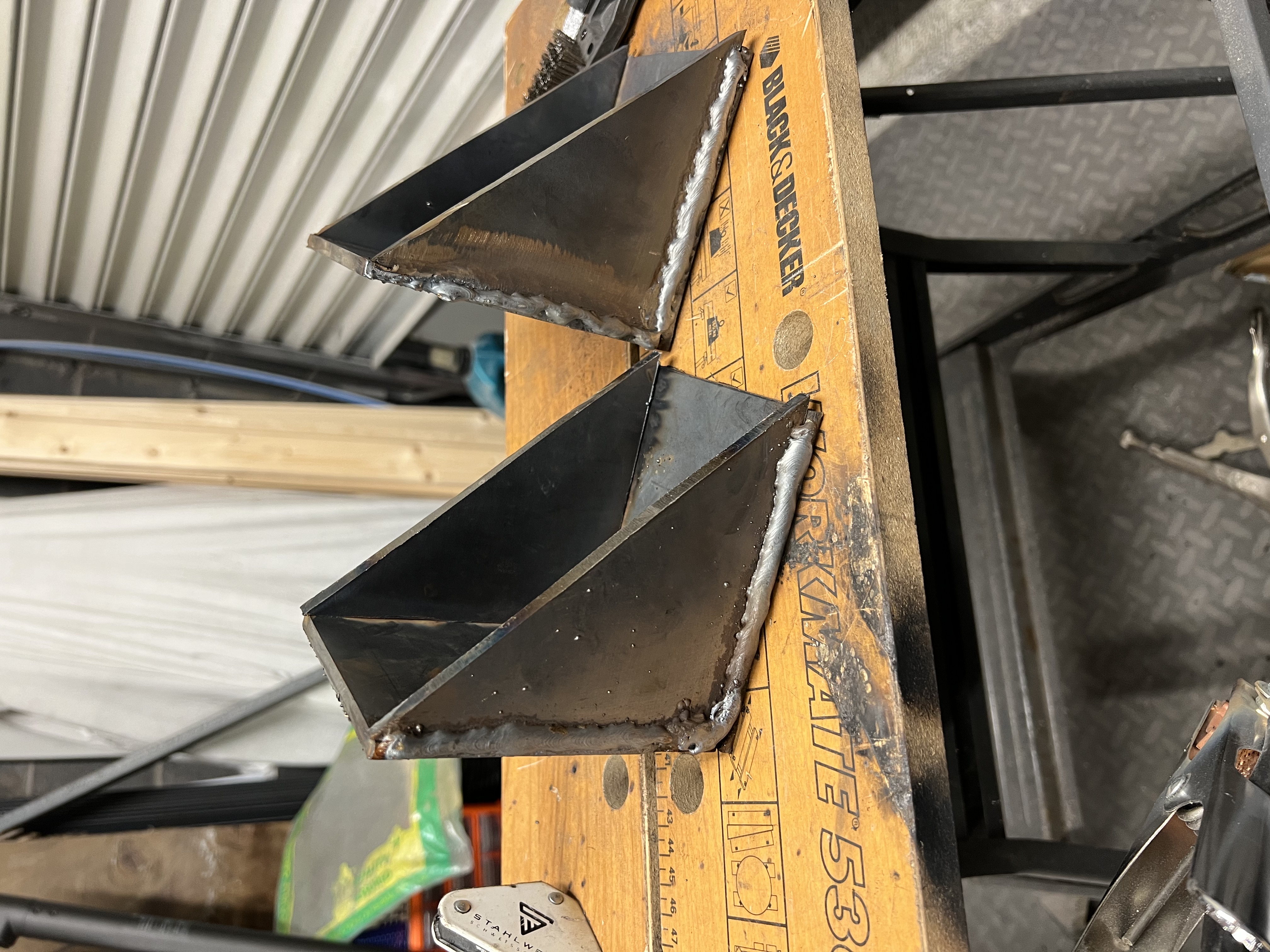 Pieces for upper mounting brackets (badly) welded together.